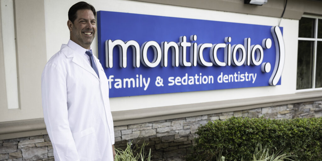 Smiling dentist at Monticciolo Family Dentistry.